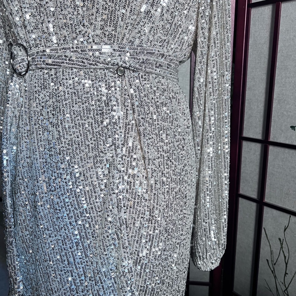 Millibon from China. Silver sequin tunic top Medium. 33 inch length P2P 20 NWOT